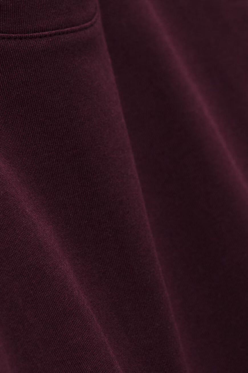 Close-up of maroon fabric texture