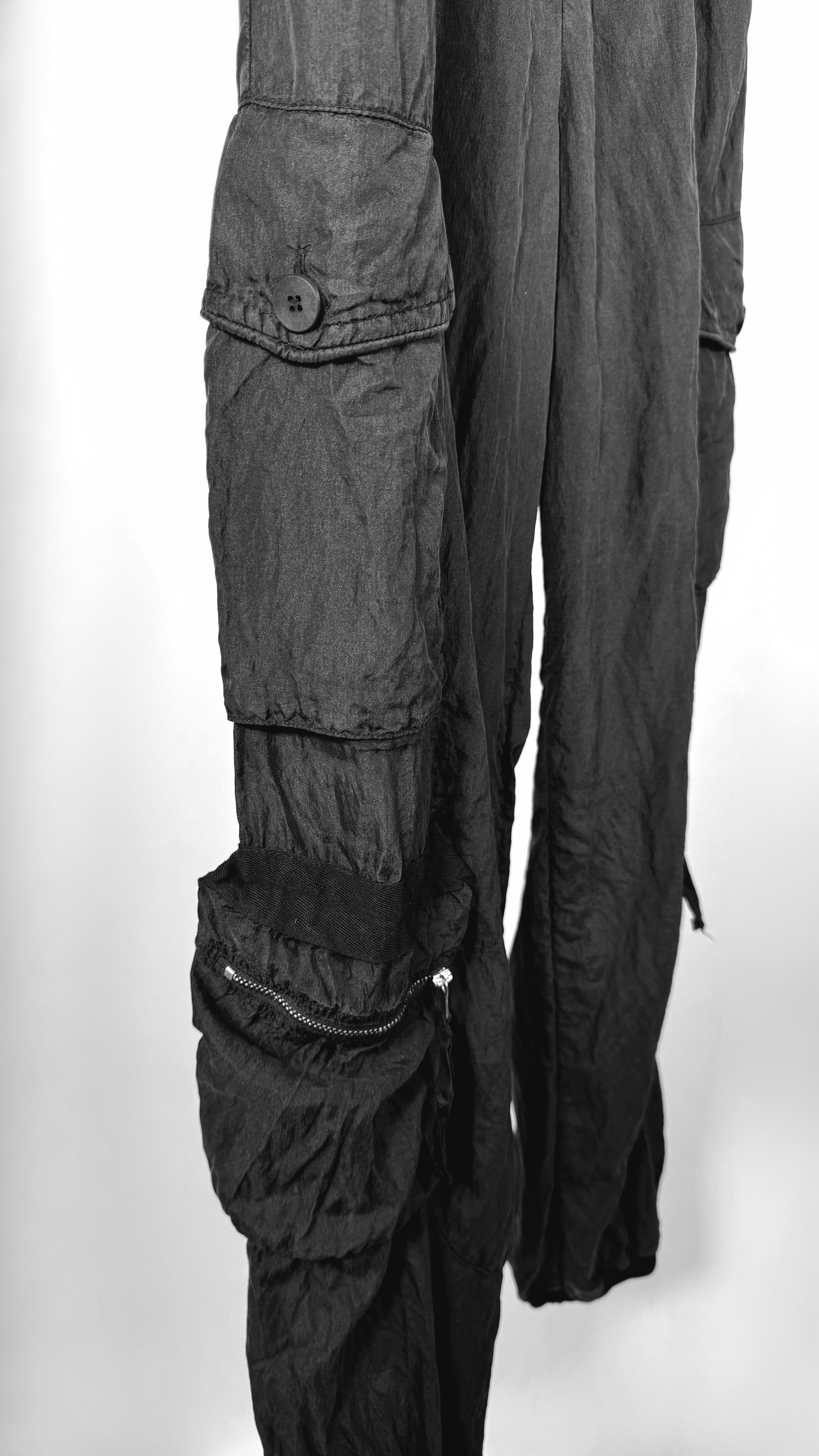 Black cargo pants on a white background