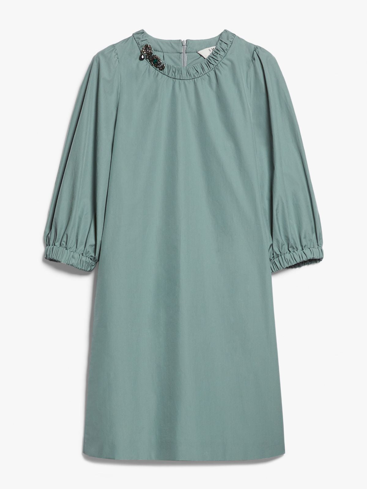 Green dress with long sleeves on a white background