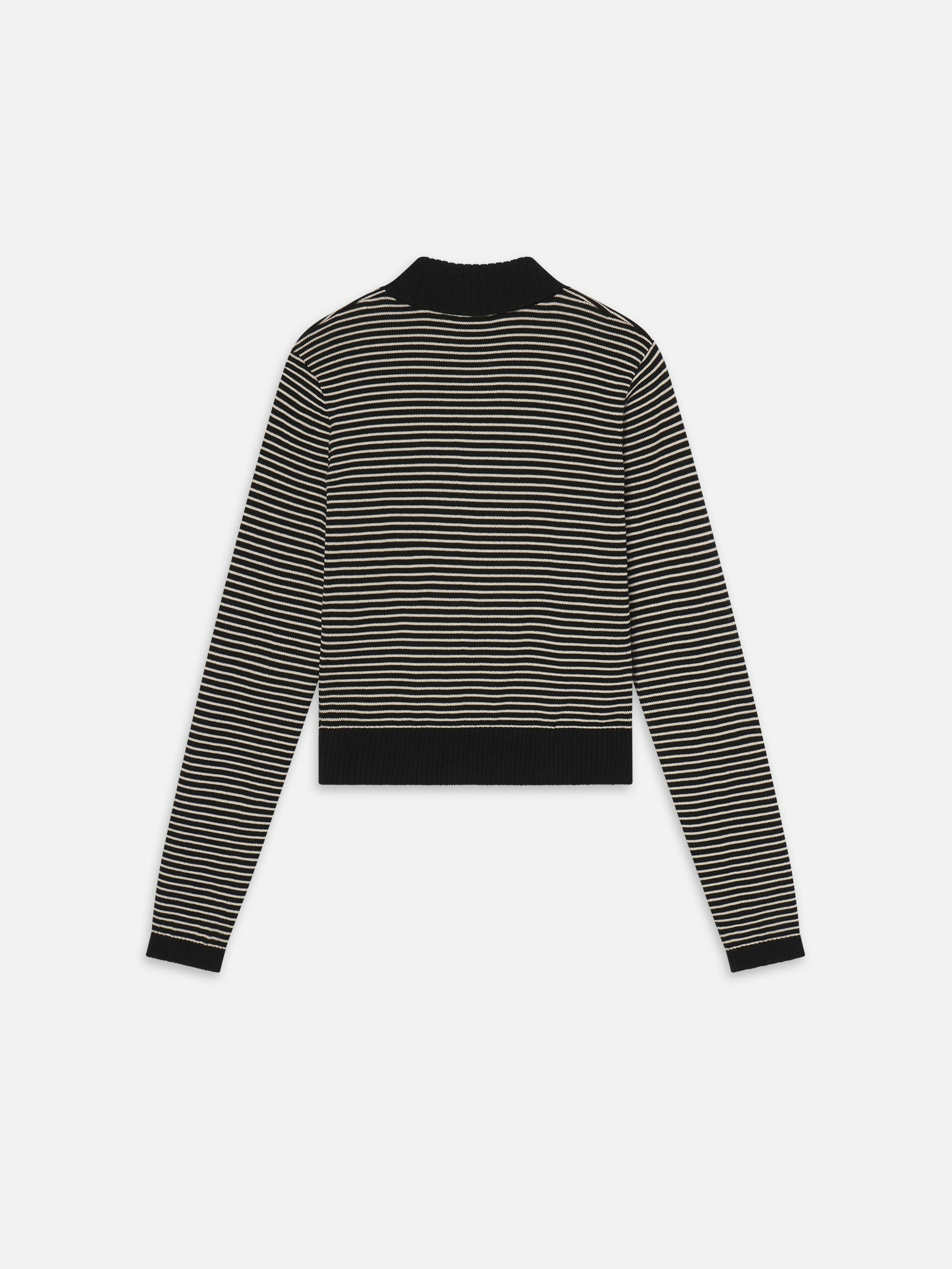 Black and white striped sweater on a white background