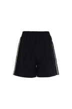 Black shorts with white trim on a white background