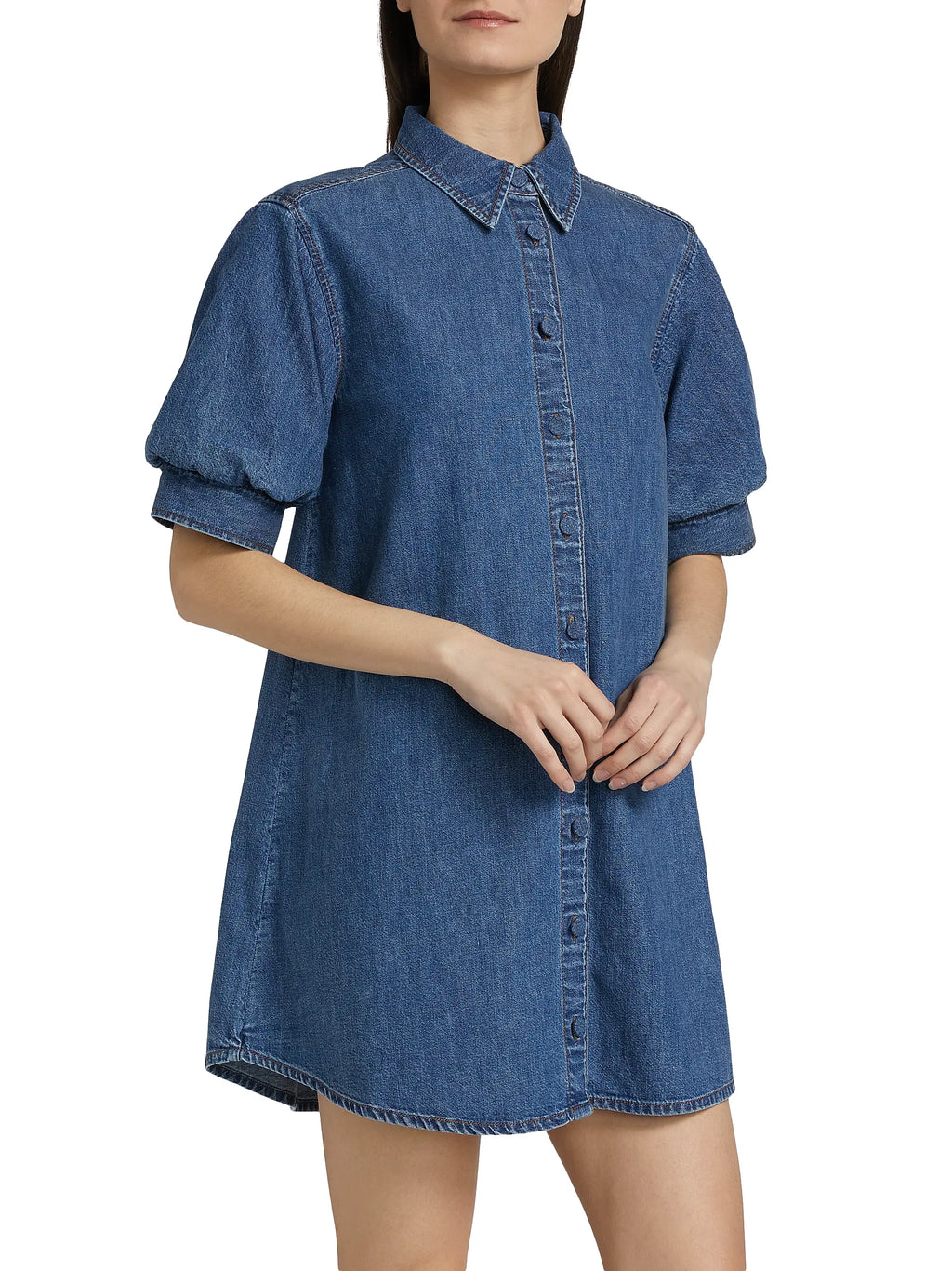 Denim dress with puff sleeves worn by a model on a white background