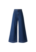 Blue wide-leg jeans on a white background