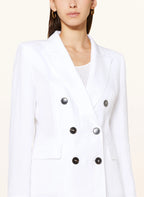 A white linen blazer with a lapel collar, double-breasted button details, and a slightly tailored cut.
