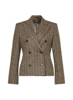 Houndstooth patterned blazer on a white background
