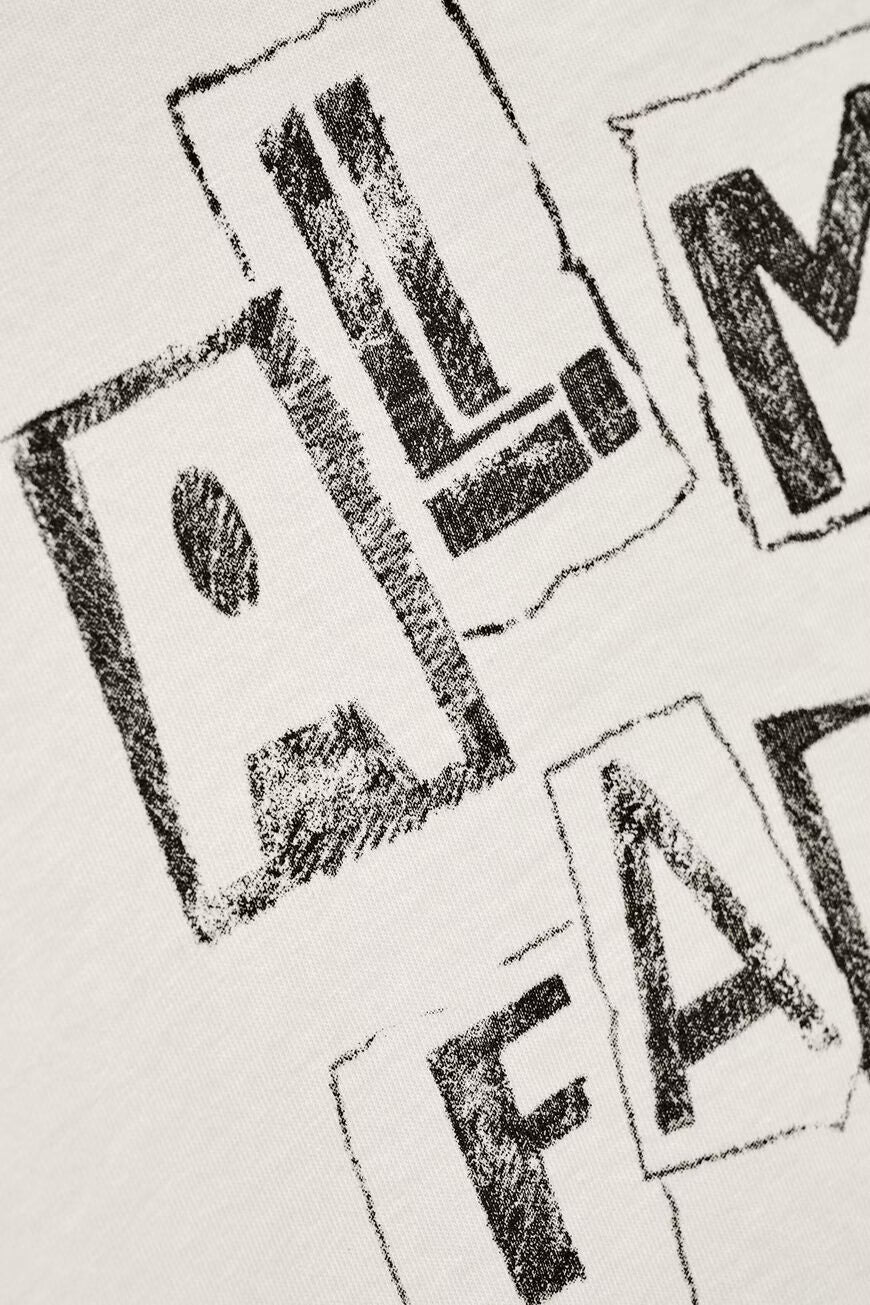 Black ink blots on a white background