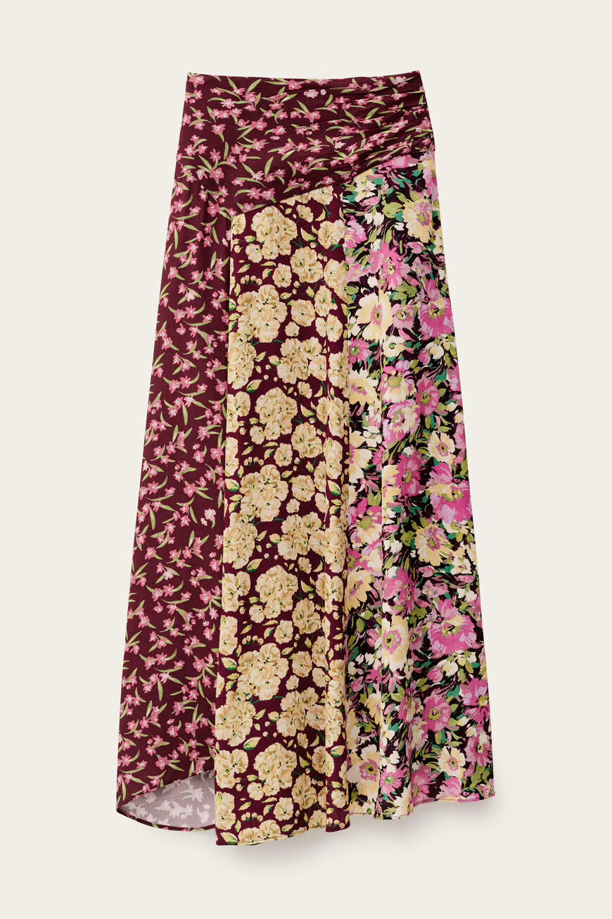 Floral patterned skirt with three different designs on a light background