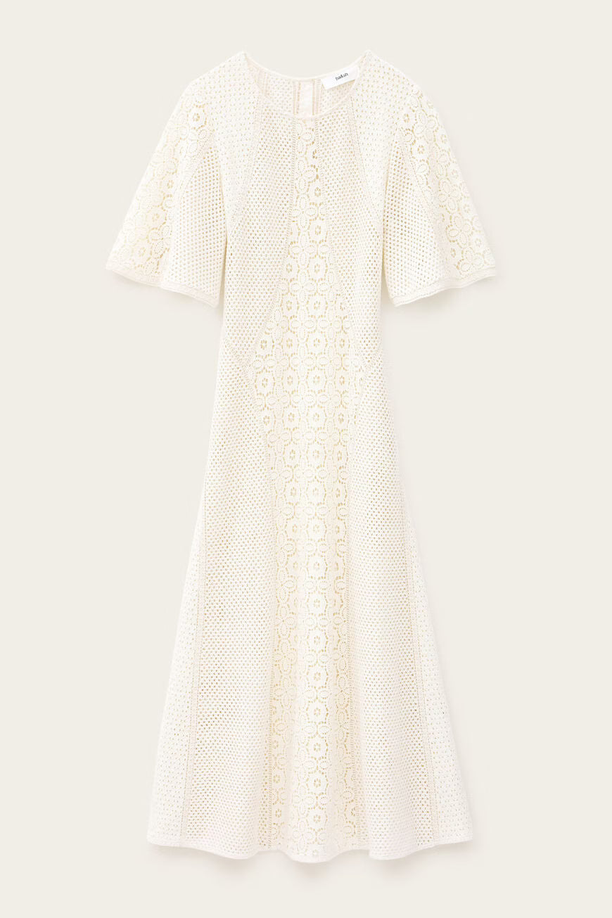 White lace dress on a light beige background