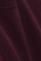 Close-up of maroon fabric texture