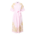 Pink dress with gold floral patterns on a white background