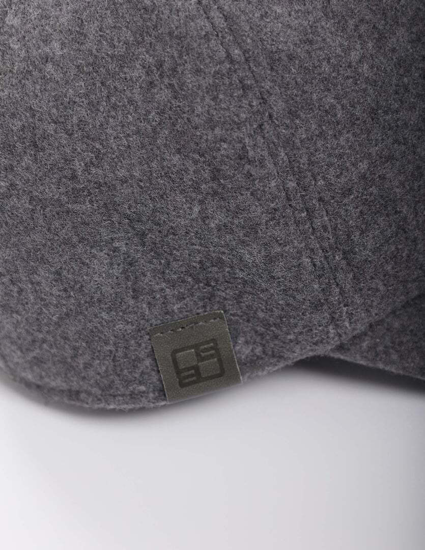 Gray cap with a brand logo on a white background
