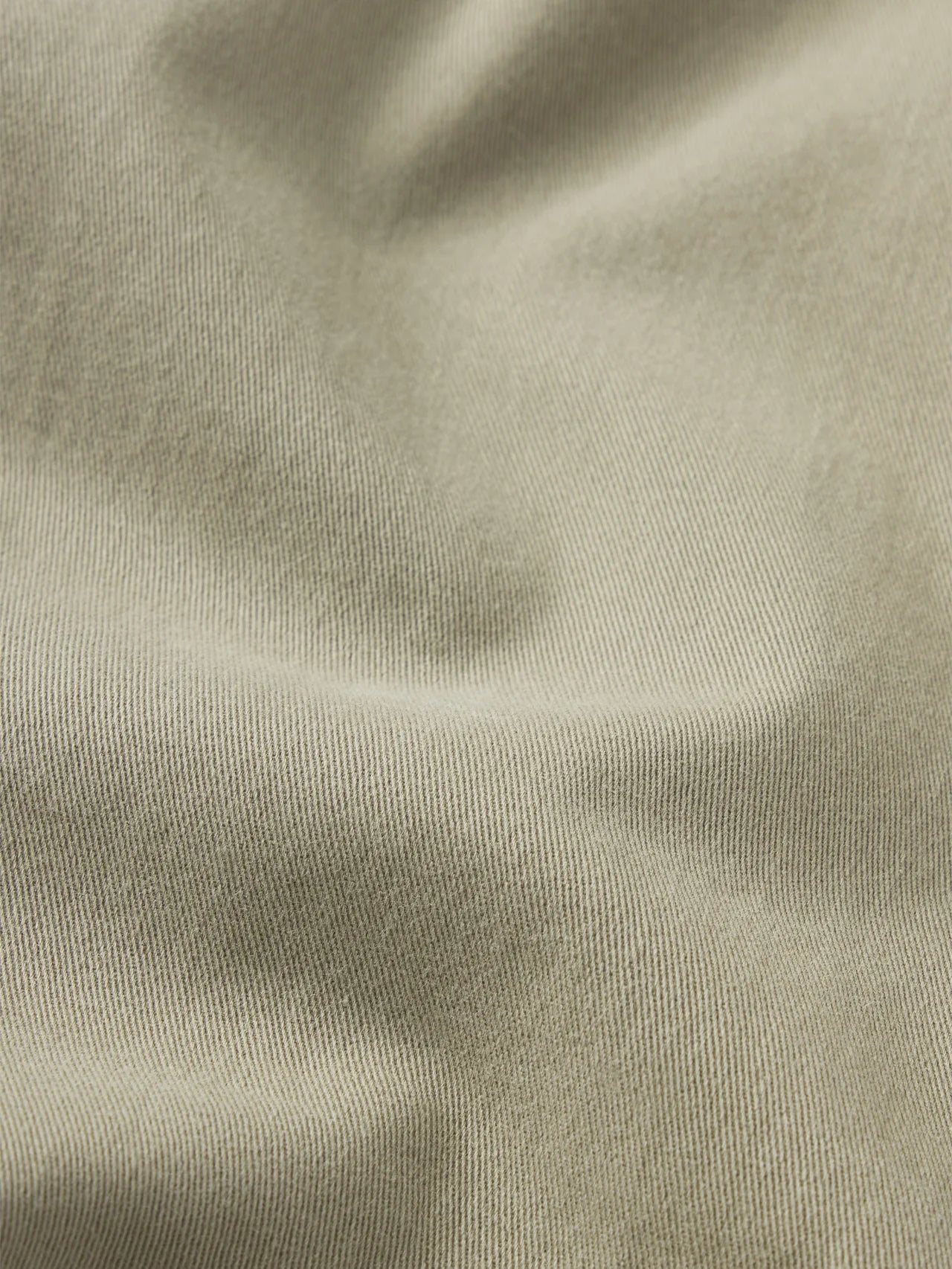 Close-up of beige fabric texture