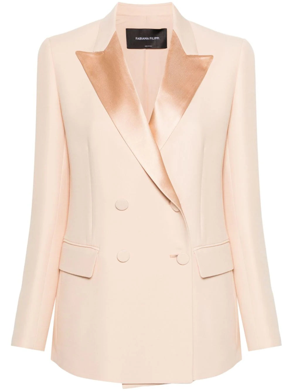A double-breasted, pink-colored jacket with a silk lapel, displayed on a mannequin.