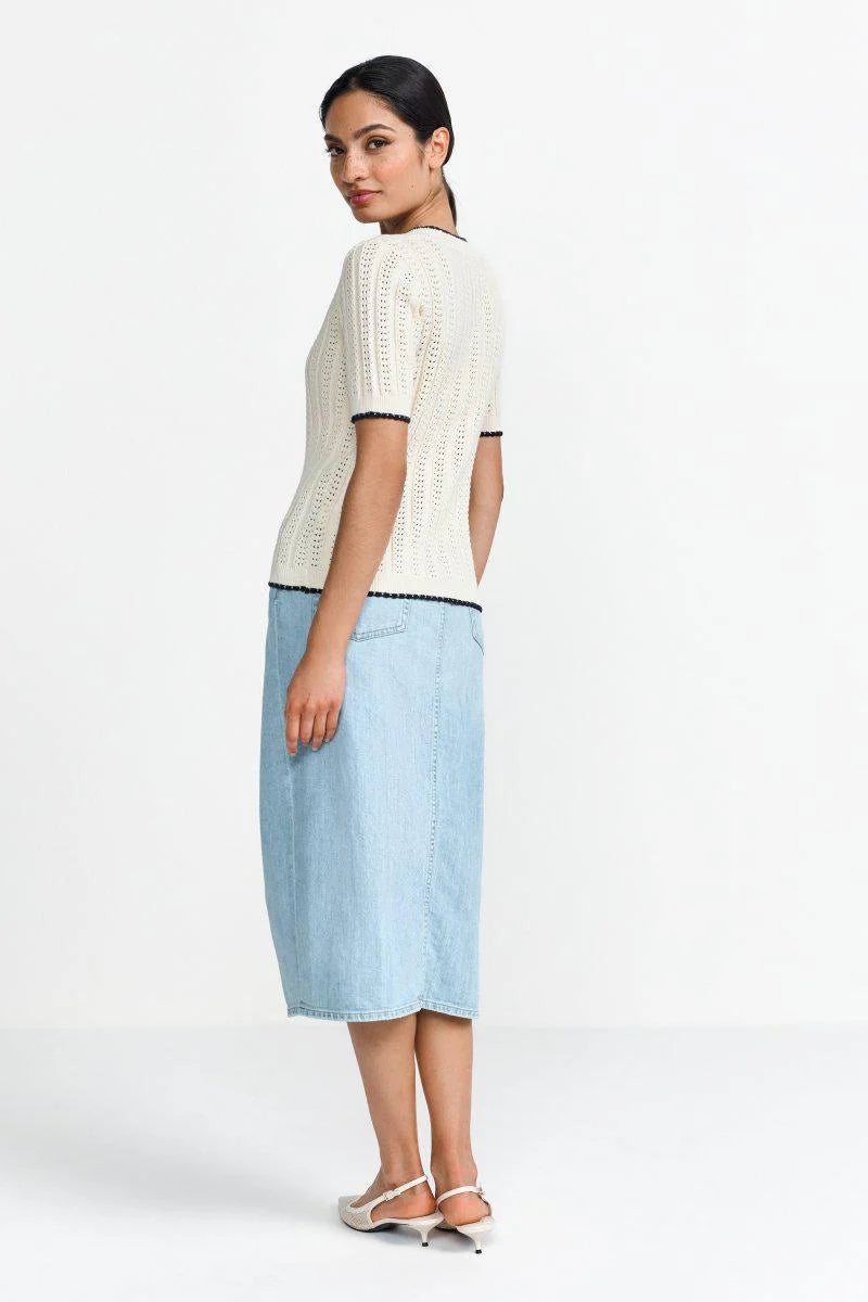 Knitted shirt with fine perforated pattern