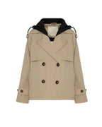 A beige double-breasted trench coat with a black hood featuring chain details, displayed on a clean white background.
