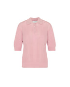 A light pink ribbed knit polo shirt with three-quarter sleeves and a three-button placket, displayed on a clean white background.