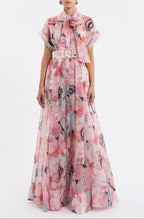  floral bridal bouquet gown with short sleeves, a pussy bow neck detail, and a full skirt 