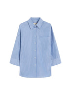 Blue and white striped shirt on a light gray background
