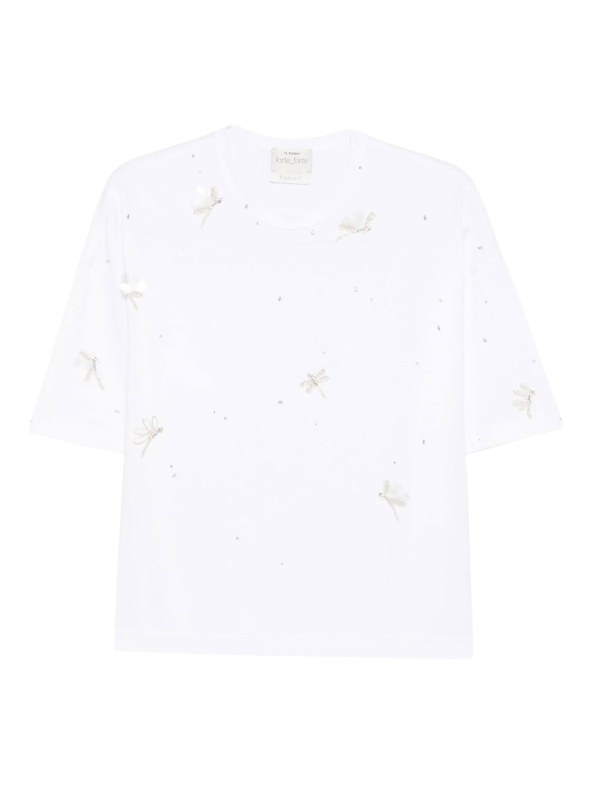 White t-shirt with small embroidered designs on a white background