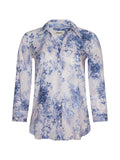 l'agence White blouse with blue floral pattern on a white background