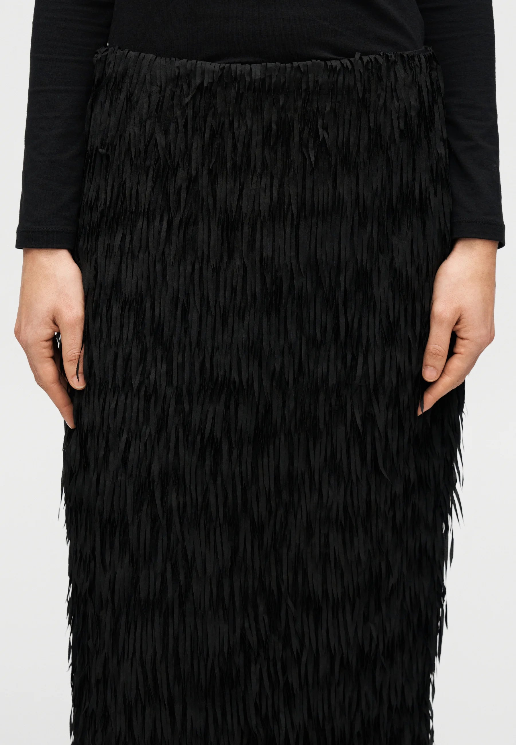 Sabrina fringes Black skirt worn by a person on a white background day Birger et Mikkelsen 