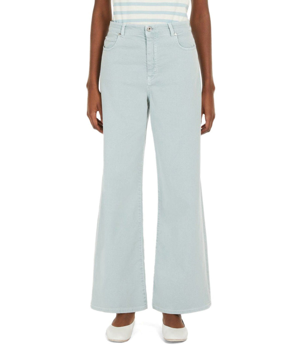 Light blue wide-leg jeans worn by a person on a white background