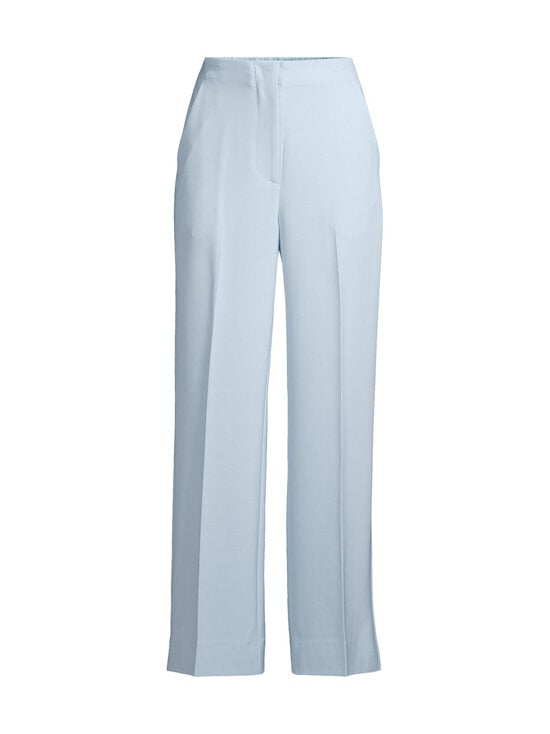 second female.Light blue pants on a white background.shop online