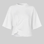 White blouse with a knot detail on a gray background