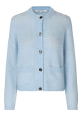 Light blue cardigan with button details on a light gray background