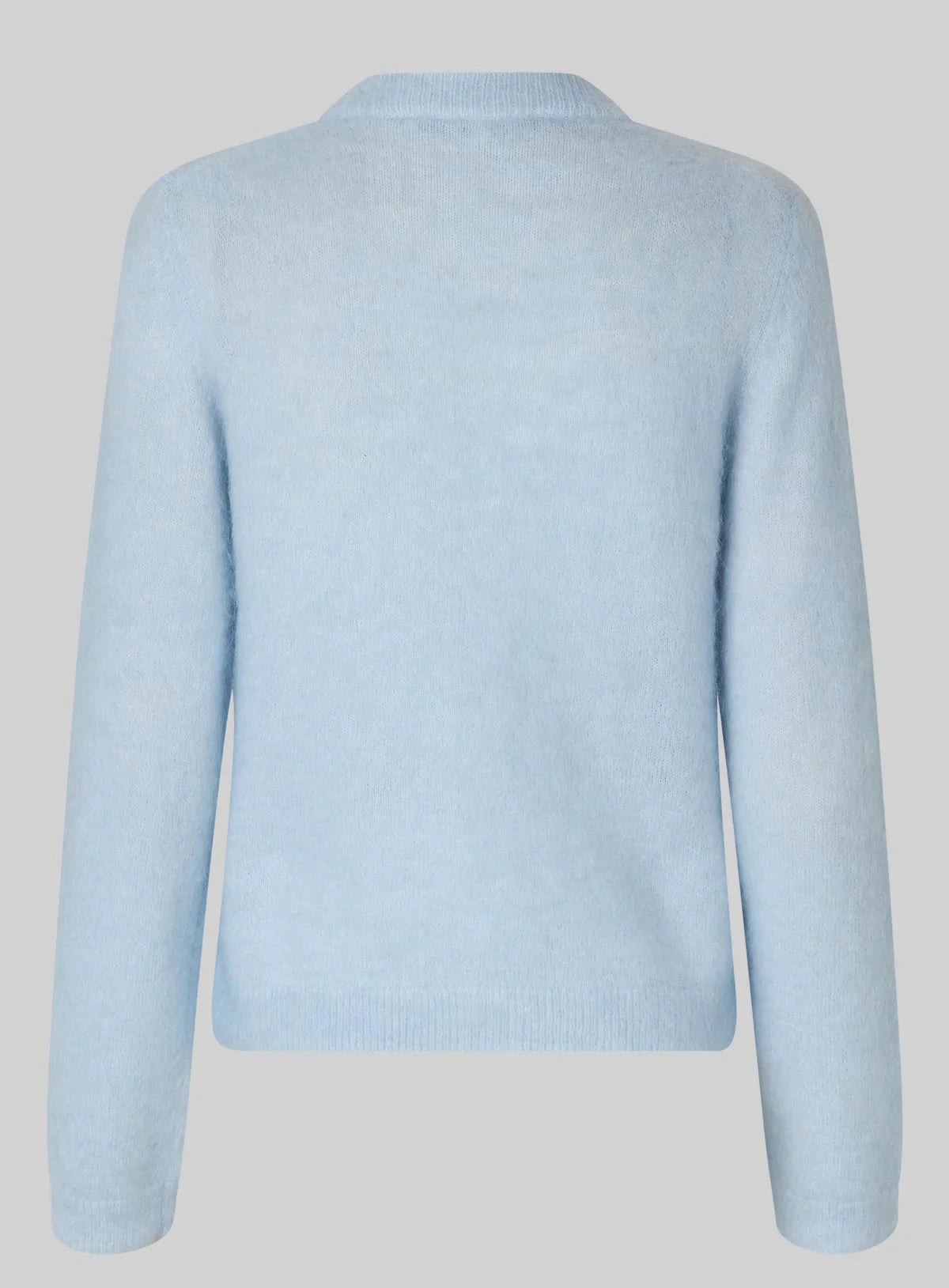 Light blue sweater on a light gray background