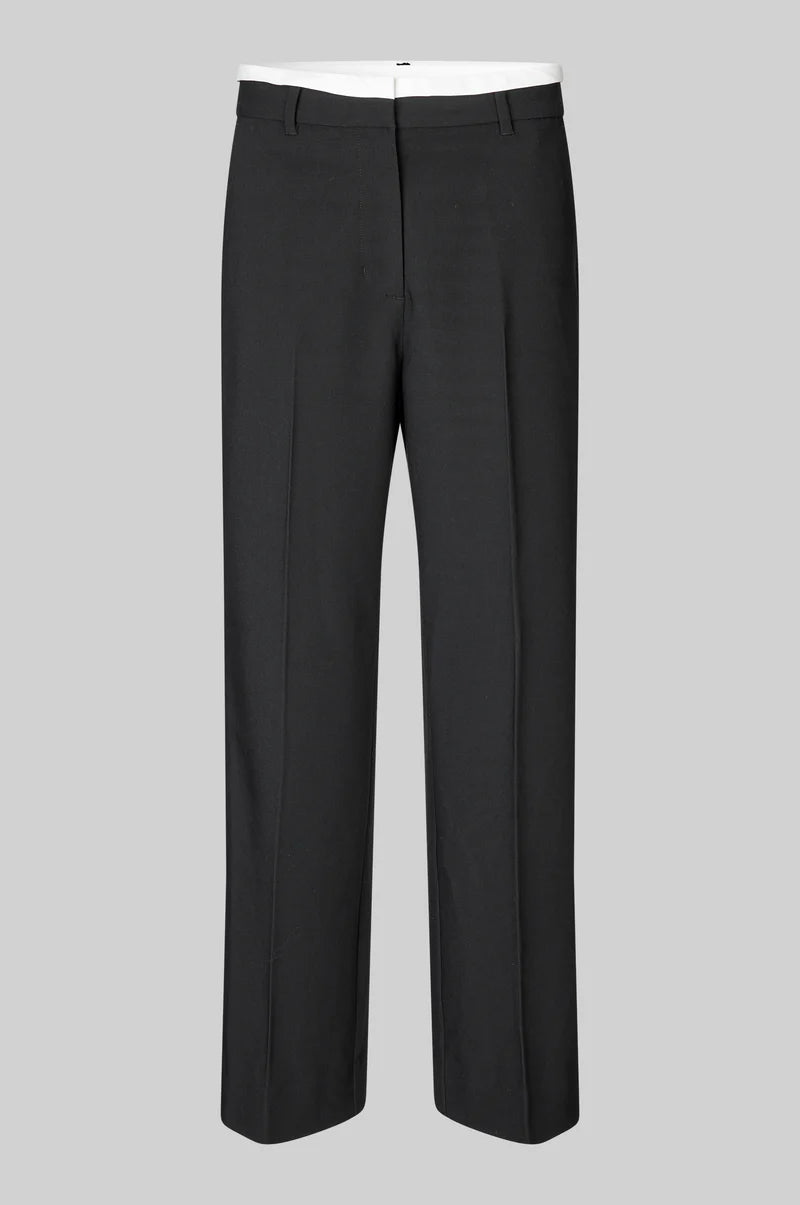 second female Herbie Black dress pants on a gray background.shop online