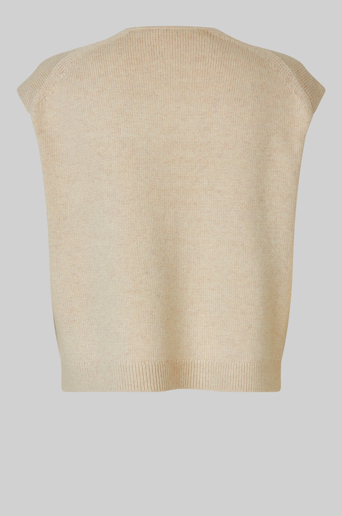 Beige knitted vest on a light gray background