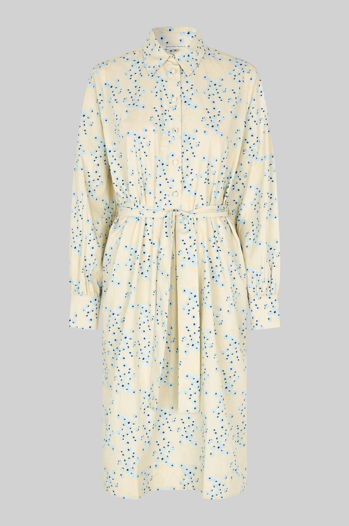 Floral patterned dress on a gray background