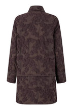 chocolate brown floral patterned dress shirt on a light gray background