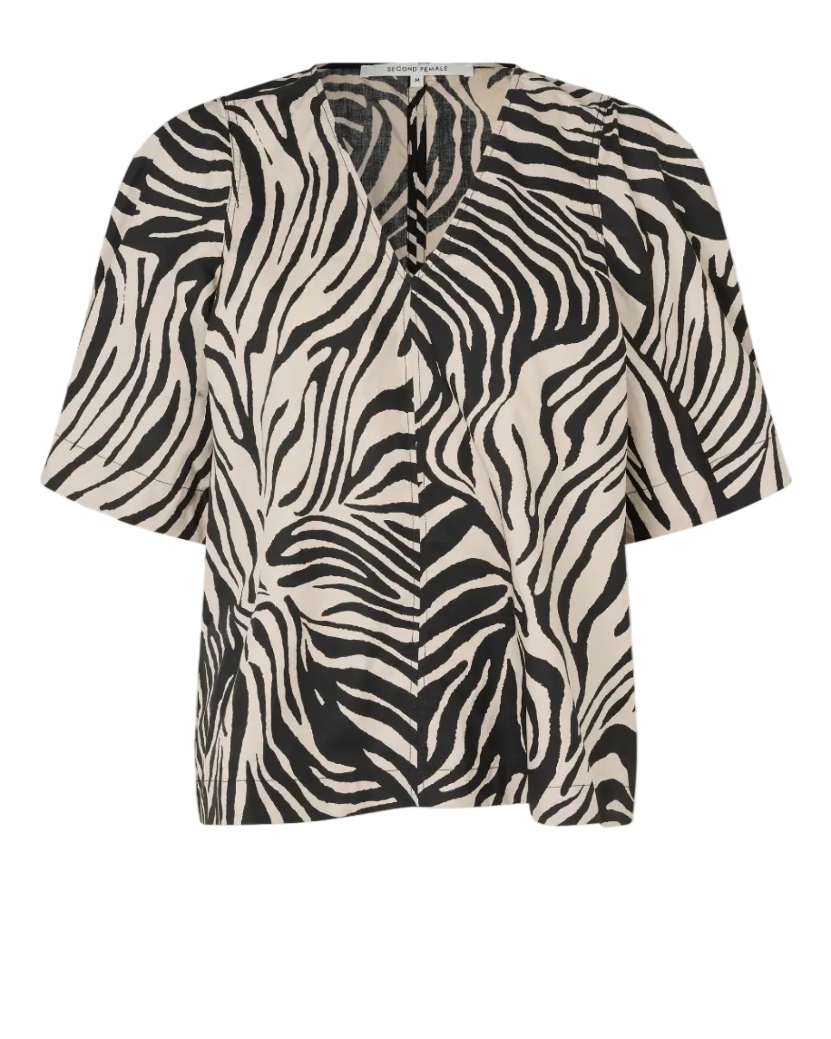 Zebra print top on a light gray background