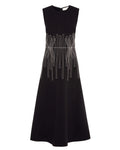 Black dress with silver geometric embroidery on a white background