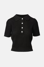 on parks black polo shirt with a collar, button-up neck, and short sleeves.