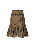 Brown skirt with black floral pattern on a white background