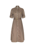 A taupe-brown utility shirt dress with a front zipper, collar, chest flap pockets, rolled sleeves, and a matching waist belt with a gold buckle, shown on a plain white background.