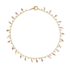 Gold necklace with colorful beads on a white background