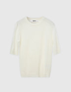 White t-shirt with 'DAY' branding on a white background