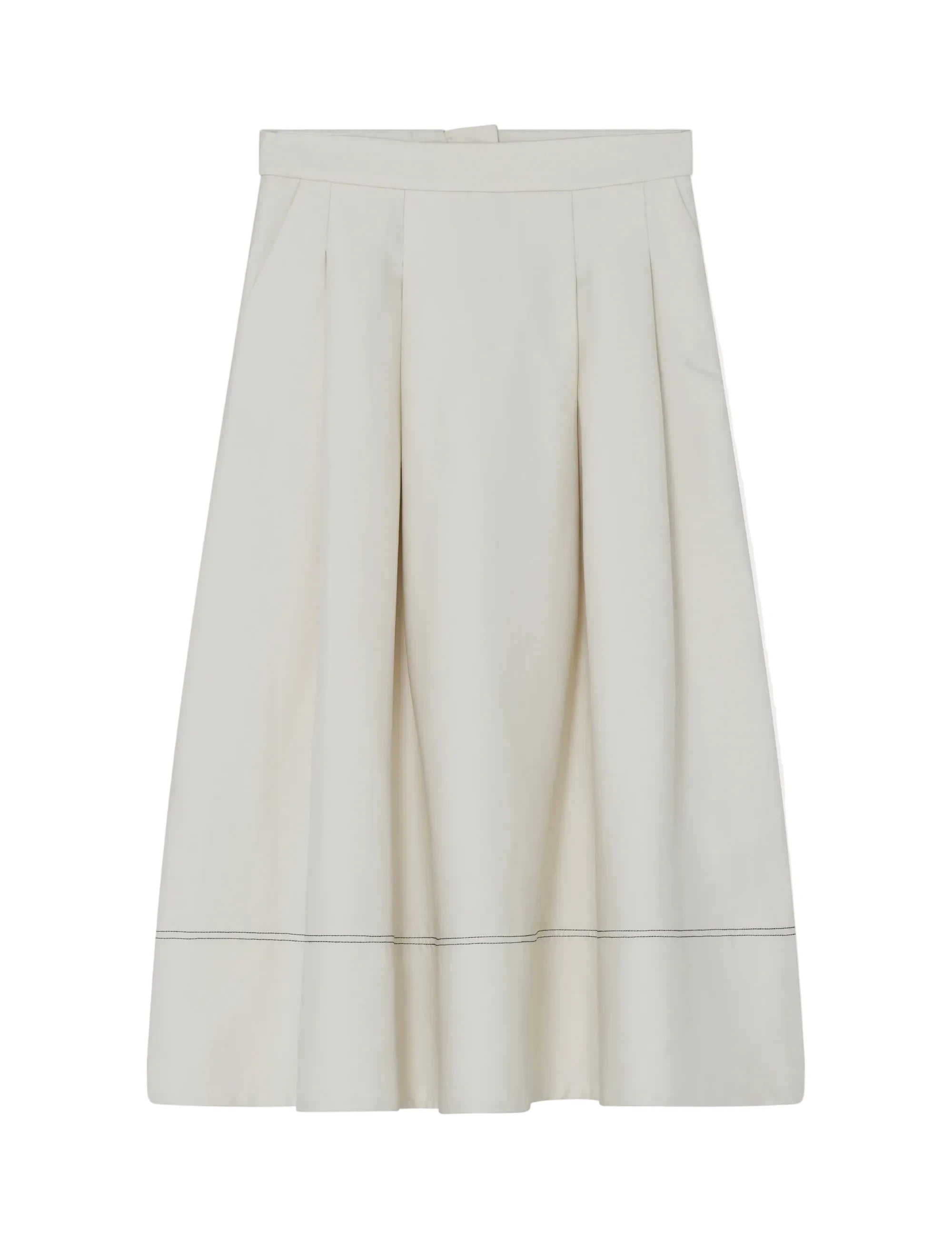 White skirt with a subtle pattern on a light gray background