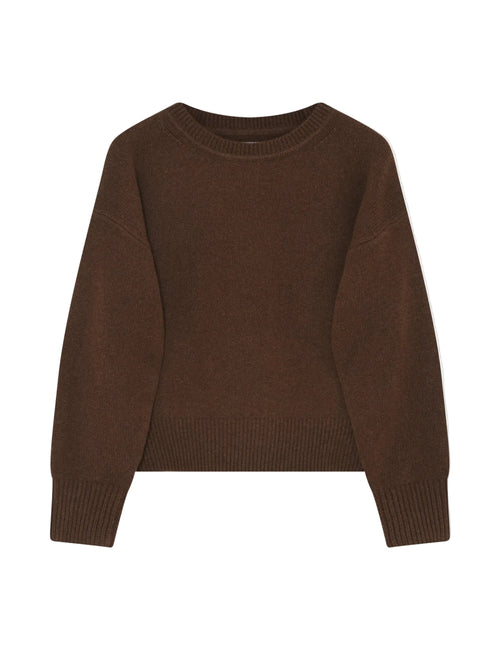 Brown sweater on a light gray background