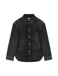 Black denim shirt with white buttons on a light gray background