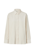 Beige shirt on a white background. Cordy second female 