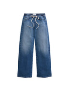 Adria cinched  ag jeans Blue jeans with a drawstring on a light gray background