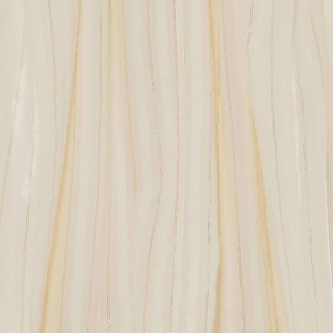 Textured beige fabric with subtle patterns