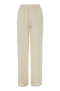 Beige ribbed pants on a white background