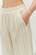 Beige pants with a plain background