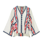 White cardigan blouse with red and blue pattern on a white background